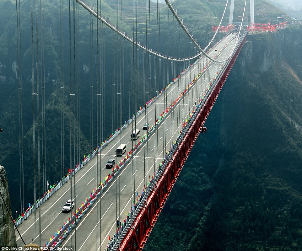 Sky high: The bridge is a key section of Jishou-Chadong Expressway and reduces driving time from 4 hours down to 1 hour