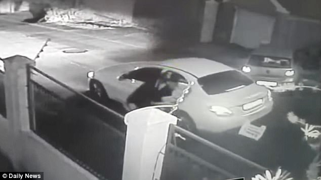 Long day at work: A white Mercedes Benz pulls up right behind the unnamed woman as she returned home from work and two hijackers jump out with the intention of stealing her car
