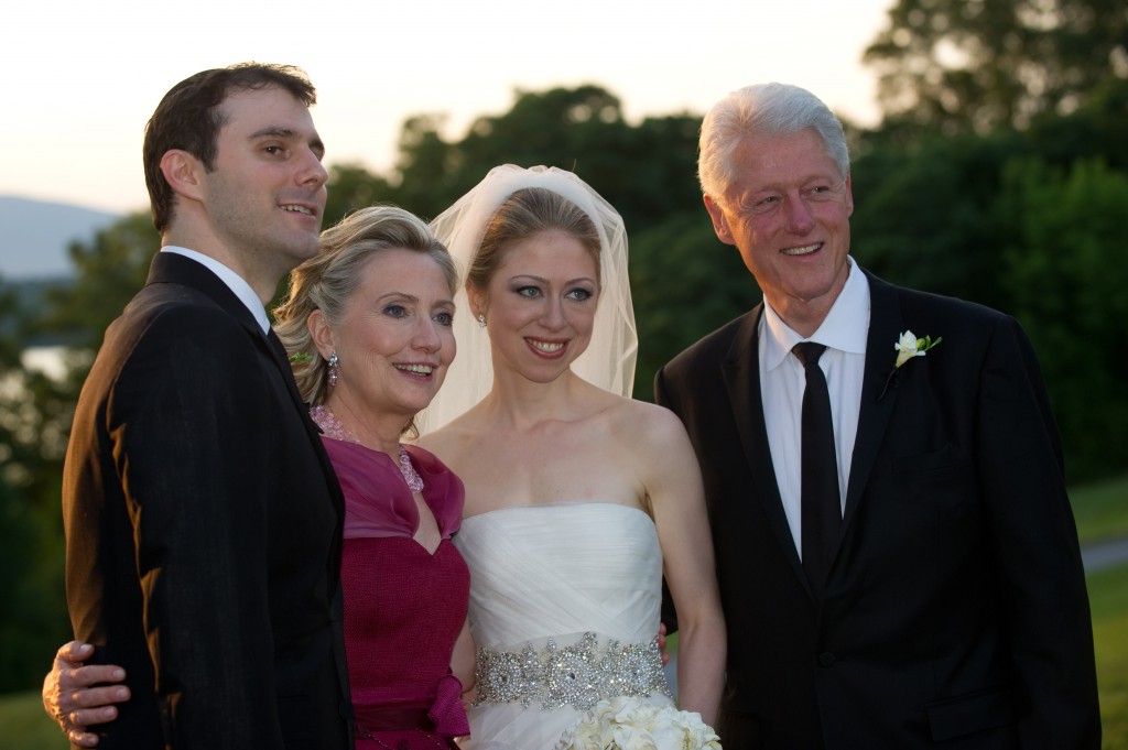 RHINEBECK, NY - JULY 31: In this handout image provided by Barbara Kinney, (L-R) Marc Mezvinsky, U.S. Secretary of State Hillary Clinton, Chelsea Clinton and former U.S. President Bill Clinton pose during the wedding of Chelsea Clinton and Marc Mezvinsky at the Astor Courts Estate on July 31, 2010 in Rhinebeck, New York. Chelsea Clinton, the daughter of former U.S. President Bill Clinton and Secretary of State Hillary Clinton, married Marc Mezvinsky today in an interfaith ceremony at the estate built by John Jacob Astor on the Hudson River about two hours north of New York City. (Photo by Barbara Kinney via FilmMagic)